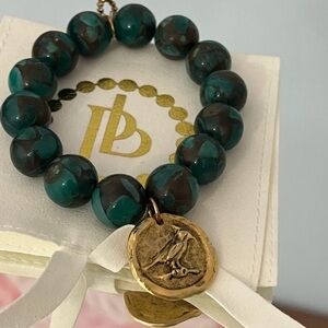 Powerbeads by Jen Green and Gold Beaded Bracelet cardinal